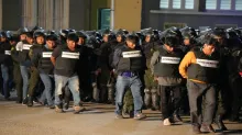 Los aprehendidos presentados por el Ministro. Foto: Ministerio de Gobierno